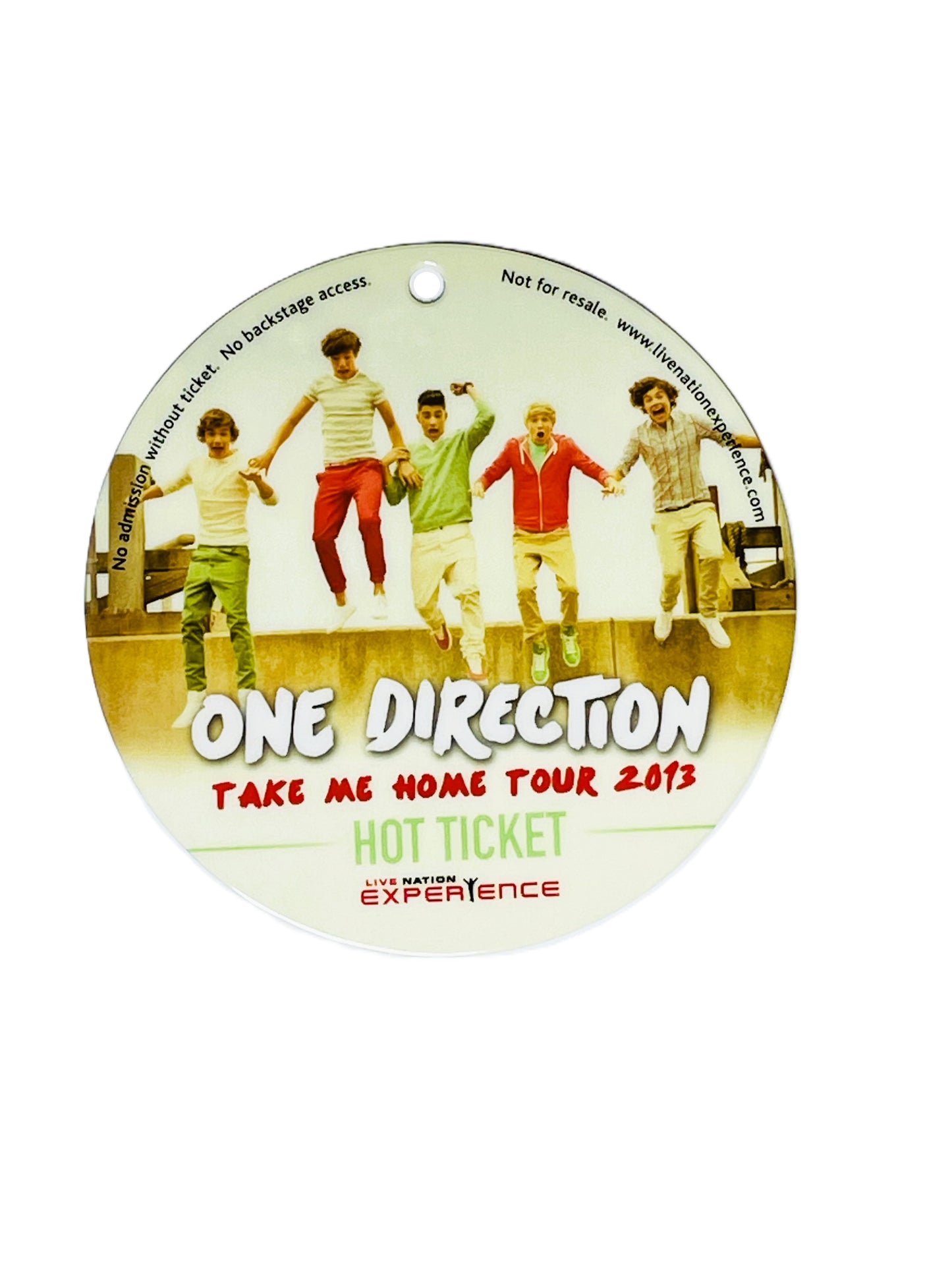 Circular 'One Direction' pass with band members and text on a white background