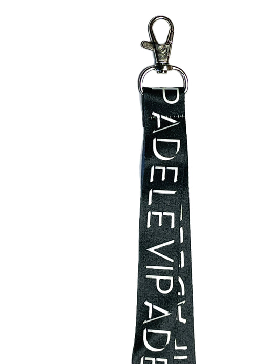 Black lanyard with Adele in white text.