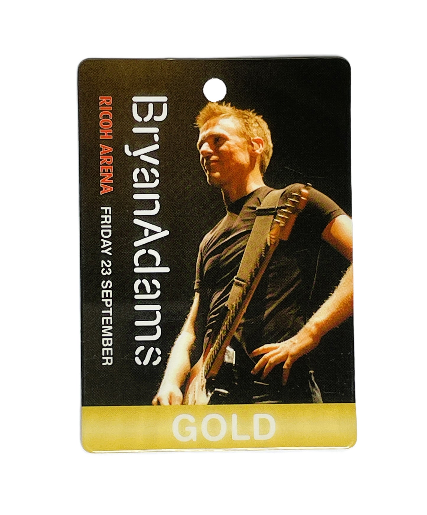 Bryan Adams concert ticket with a photo of the artist and event details on a black background.