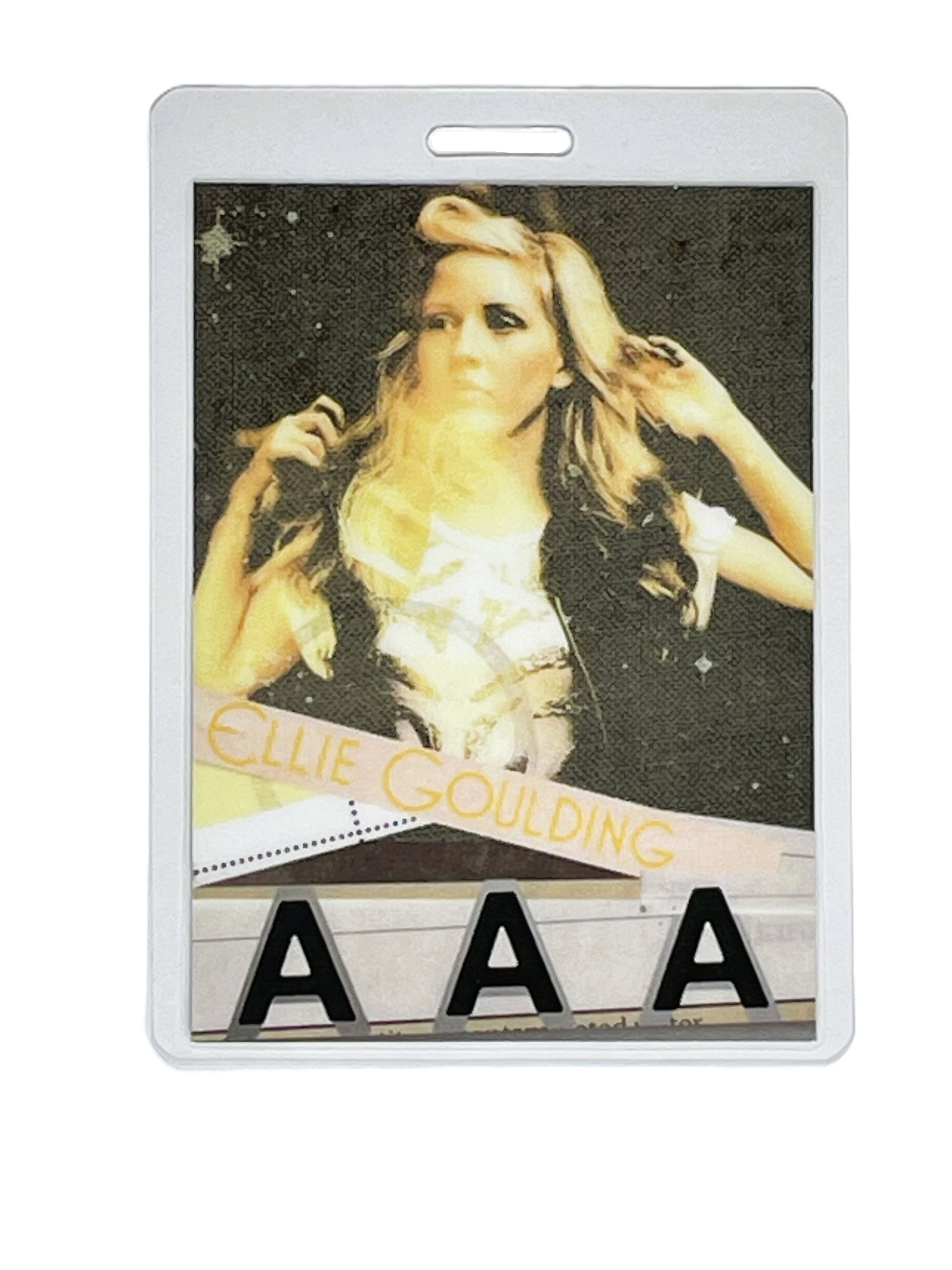 Laminated concert pass with a photo of 'Ellie Goulding' with AAA text.