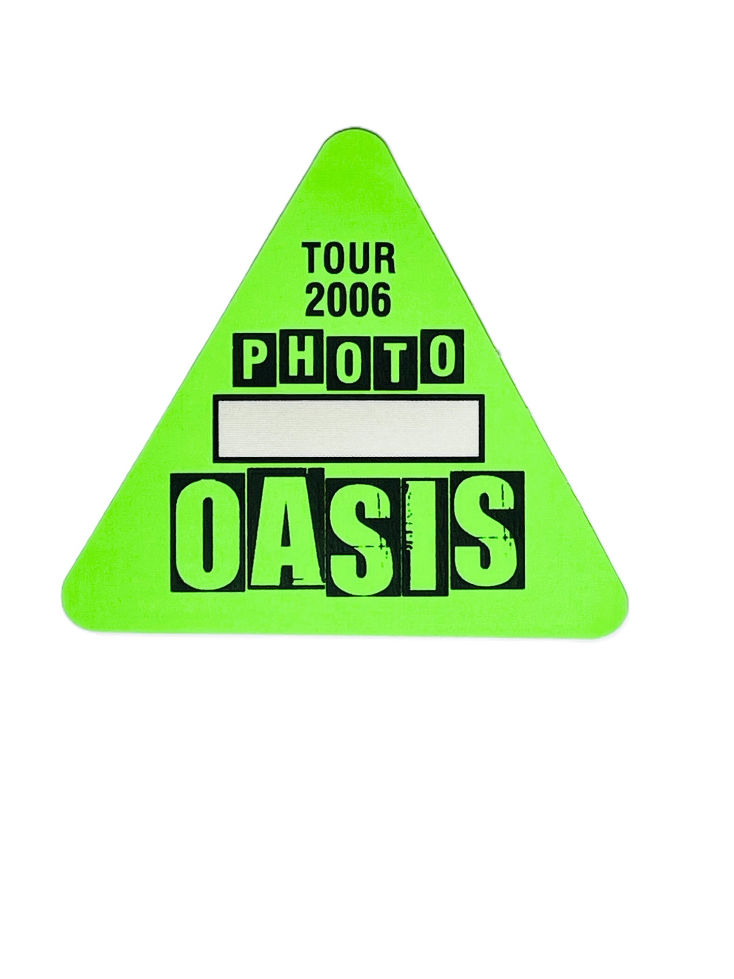 Triangular green pass with black text 'OASIS TOUR 2006 PHOTO'