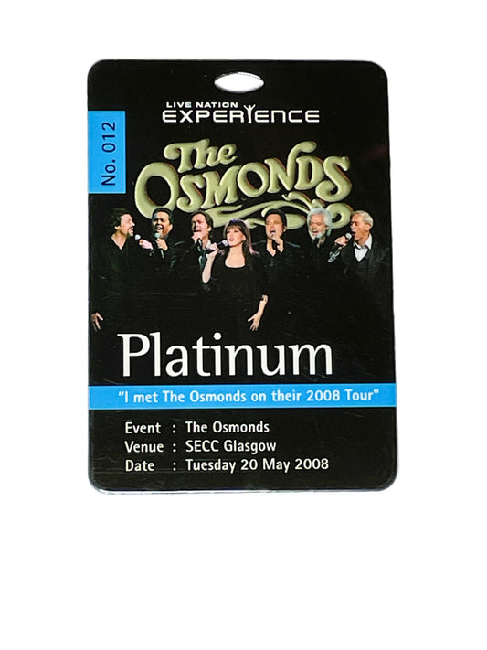 Memorabilia card featuring The Osmonds with event details 