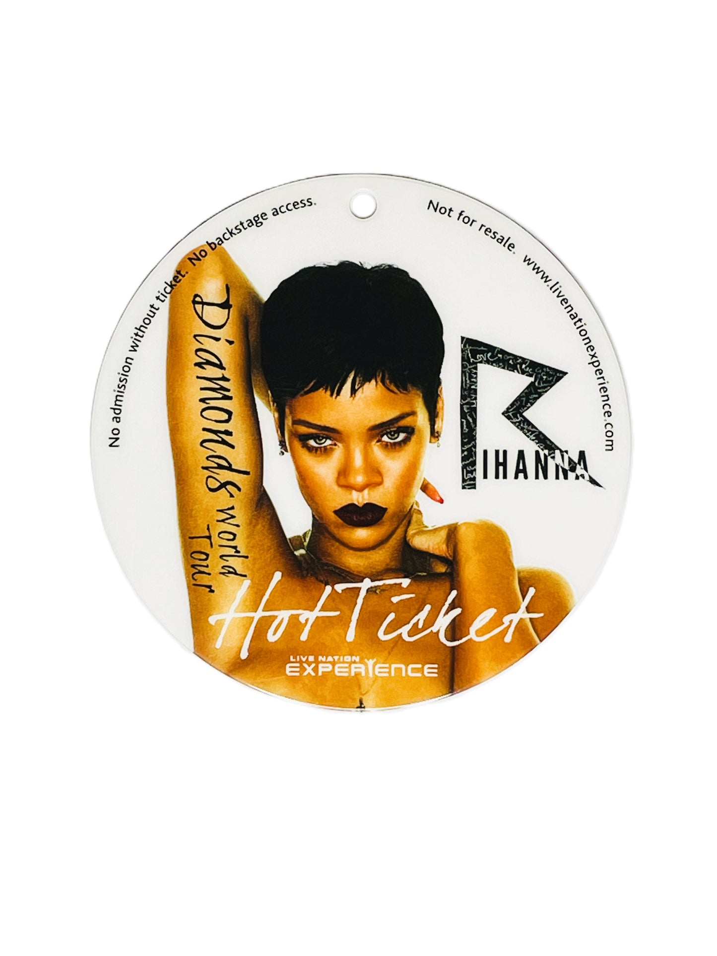 Round promotional item with a person's face and 'Rihanna' branding on a white background