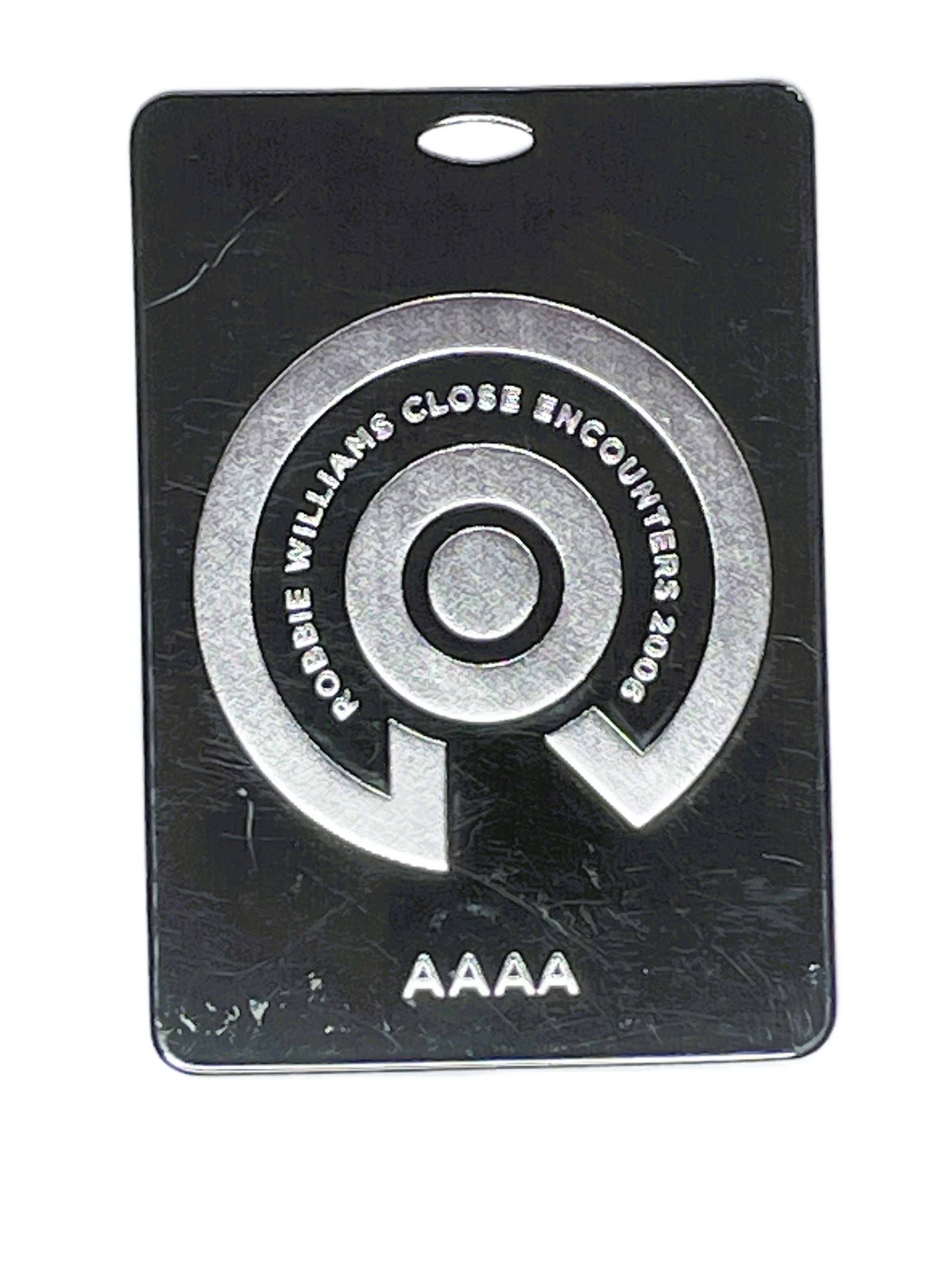 Black and silver pass with circular design in foil 