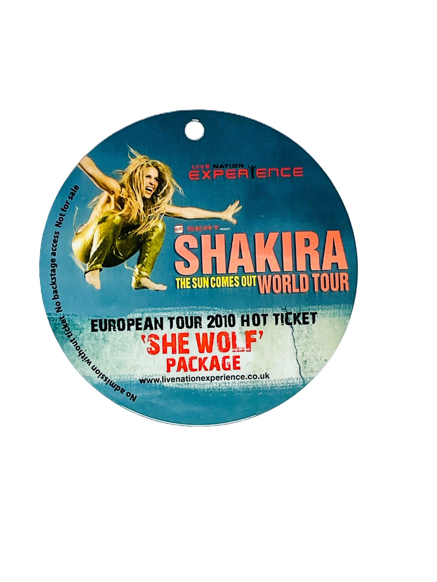 Round pass for Shakira's 'The Sun Comes Out World Tour' with a blue border and image of Shakira.