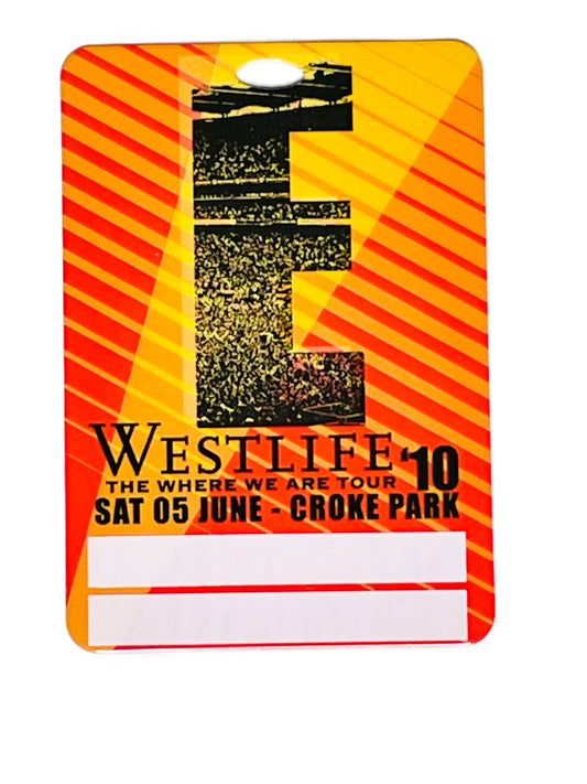 Promotional card for Westlife concert at Croke Park with orange and yellow design.